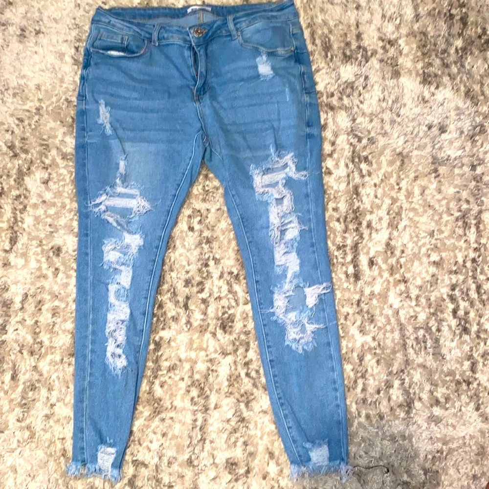 Distressed blue jeans